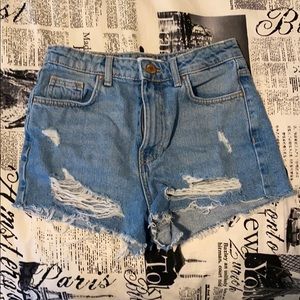 Distressed denim shorts